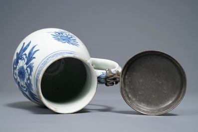 A Japanese blue and white pewter-mounted Arita jug, Edo, 17/18th C.