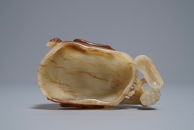 A Chinese lotus-shaped russet jade libation cup, 18/19th C.