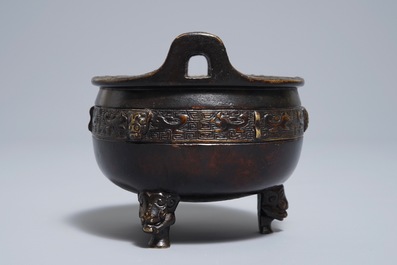 A Chinese bronze tripod incense burner, Xuande mark, 19th C.