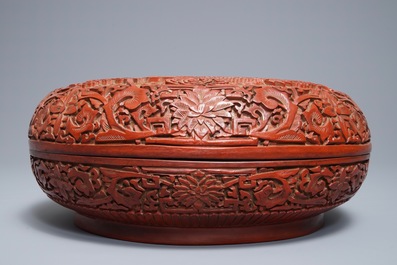 A Chinese cinnabar lacquer 'dragon' box, Qianlong mark, 18/19th C.