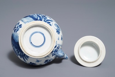 A Chinese blue and white gate-handled teapot and cover, Kangxi