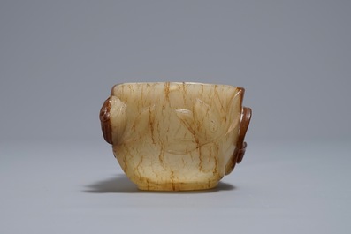 A Chinese lotus-shaped russet jade libation cup, 18/19th C.