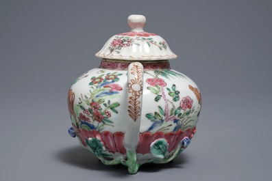 Een Chinese famille rose theepot en deksel met bloemen en takken in reli&euml;f, Yongzheng