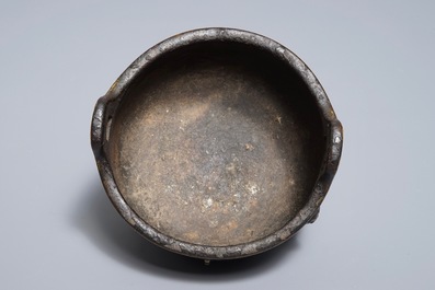 A Chinese bronze tripod incense burner, Xuande mark, 19th C.