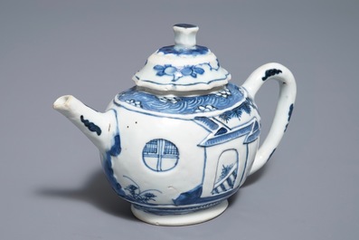 Een Chinese blauwwitte theepot met reli&euml;fdecor, Kangxi