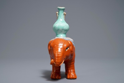 A Chinese famille rose elephant joss stick holder, 19th C.
