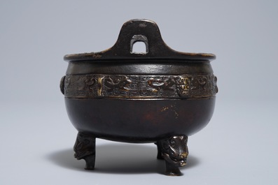 A Chinese bronze tripod incense burner, Xuande mark, 19th C.
