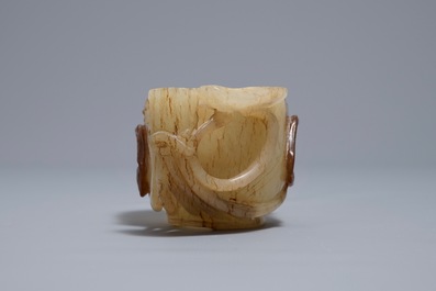 A Chinese lotus-shaped russet jade libation cup, 18/19th C.