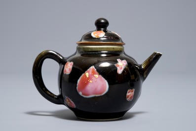 A small Chinese famille rose black ground teapot and cover, Yongzheng/Qianlong