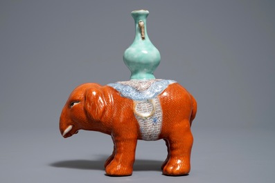 A Chinese famille rose elephant joss stick holder, 19th C.