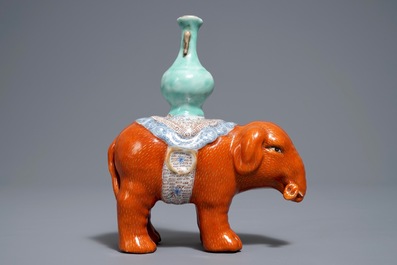 A Chinese famille rose elephant joss stick holder, 19th C.
