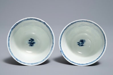 A pair of Chinese blue and white cups and saucers with Johanneum marks, Kangxi