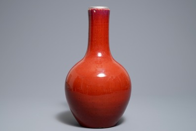 A Chinese monochrome oxblood-glazed bottle vase, 19th C.