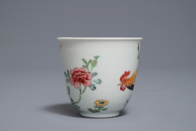 A Chinese famille rose cup and saucer with roosters, Yongzheng
