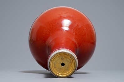 A Chinese monochrome oxblood-glazed bottle vase, 19th C.