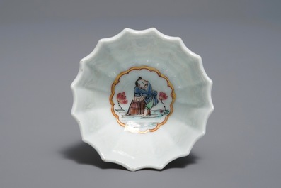 A Chinese famille rose cup and saucer with fishermen, Yongzheng