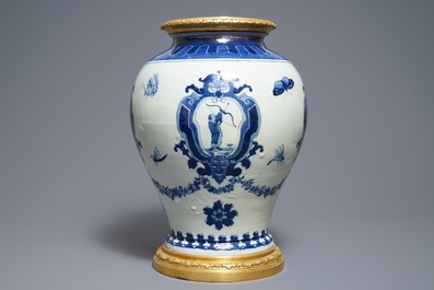 A Chinese blue and white ormolu-mounted 'The Archer' cistern after Cornelis Pronk, Qianlong, ca. 1740