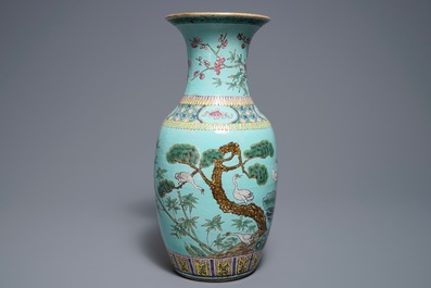 A Chinese famille rose turquoise ground vase, 19th C.