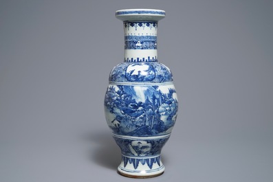 A Chinese blue and white vase with figures in a landscape, 19th C.
