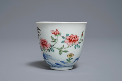 A Chinese famille rose cup and saucer with roosters, Yongzheng