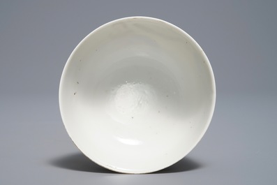 A Chinese famille rose 'European subject' cup and saucer, Qianlong