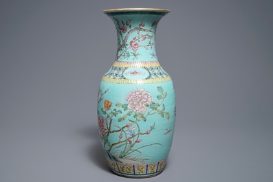 A Chinese famille rose turquoise ground vase, 19th C.