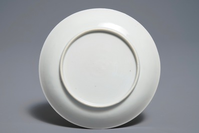 A Chinese famille rose cup and saucer with roosters, Yongzheng