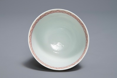 A Chinese famille rose cup and saucer with roosters, Yongzheng