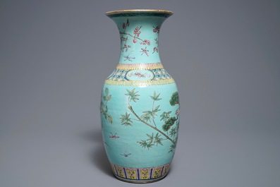 A Chinese famille rose turquoise ground vase, 19th C.