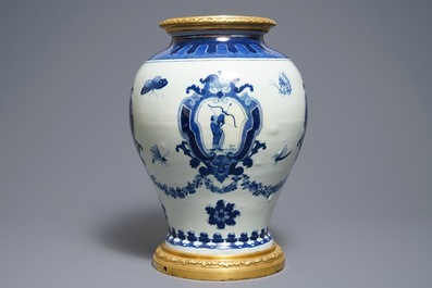 A Chinese blue and white ormolu-mounted 'The Archer' cistern after Cornelis Pronk, Qianlong, ca. 1740