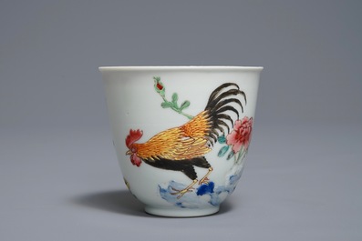 A Chinese famille rose cup and saucer with roosters, Yongzheng