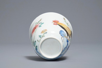 A Chinese famille rose cup and saucer with roosters, Yongzheng