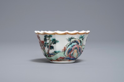 A Chinese famille rose cup and saucer with fishermen, Yongzheng