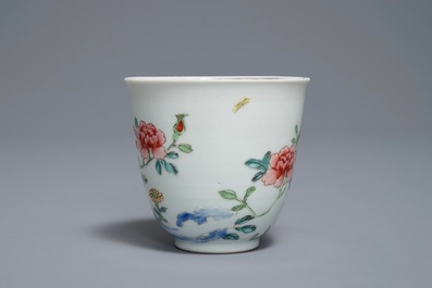 A Chinese famille rose cup and saucer with roosters, Yongzheng