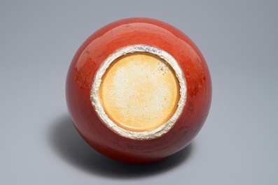 A Chinese monochrome oxblood-glazed bottle vase, 19th C.