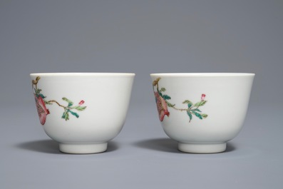 A pair of Chinese famille rose pomegranate cups, Daoguang mark, 19/20th C.