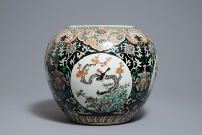 A Chinese famille noire jardini&egrave;re on stand, 19th C.