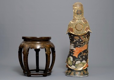 A large Japanese Satsuma figure of Kannon on laquered wooden stand, Meiji, 19/20th C.