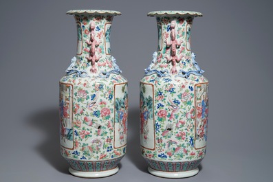 A pair of Chinese famille rose dragon-handle vases, 19th C.
