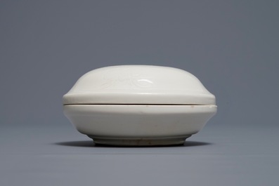 A Chinese round Dehua blanc de Chine box and cover with incised design, Ming/Qing