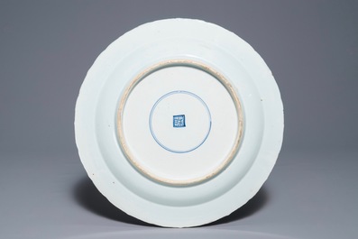A Chinese famille verte dish with ladies in a garden, Kangxi