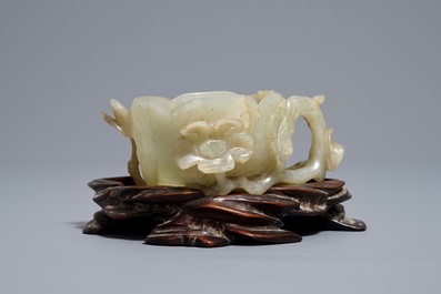 A Chinese lotus-shaped jade libation cup on stand, 18/19th C.