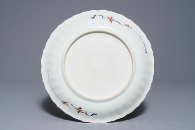 Un plat en porcelaine de Chine famille verte aux armes d'Hollande, Kangxi/Yongzheng