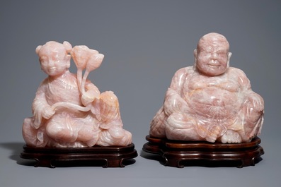 Two large Chinese pink quartz figures on wooden stands, 20th C.