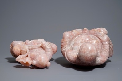Two large Chinese pink quartz figures on wooden stands, 20th C.
