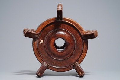 A Chinese famille noire jardini&egrave;re on stand, 19th C.