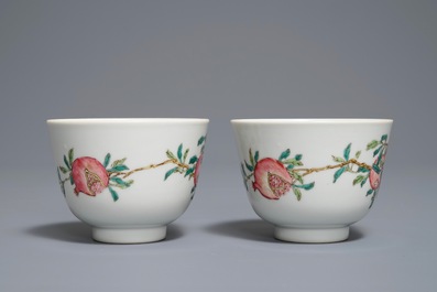 A pair of Chinese famille rose pomegranate cups, Daoguang mark, 19/20th C.