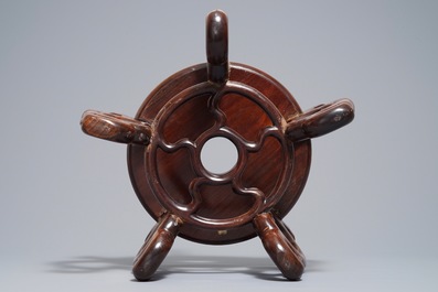 A Chinese famille noire jardini&egrave;re on stand, 19th C.