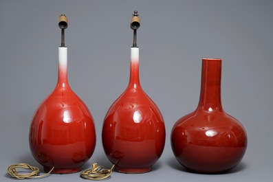 Three Chinese sang-de-boeuf-glazed bottle vases, 20th C.