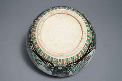A Chinese famille noire jardini&egrave;re on stand, 19th C.